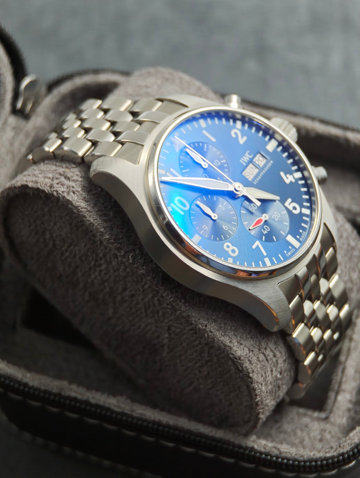 IWC Pilot's Watch Chronograph 41 case and blue dial, low side angle in a grey watch roll