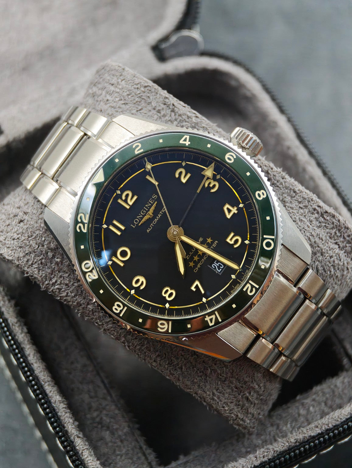 Longines Spirit Zulu Time dial and green bezel on stainless steel bracelet