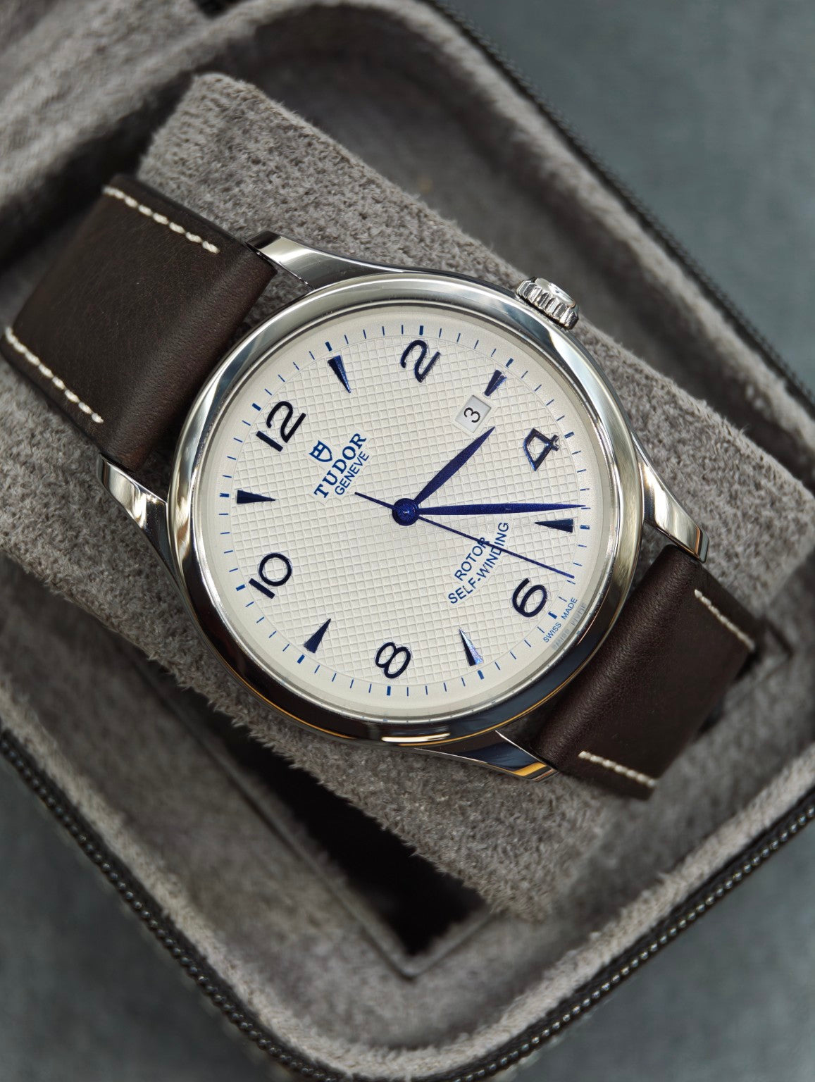 Opaline and blue Tudor 1926 dial on a brown leather strap